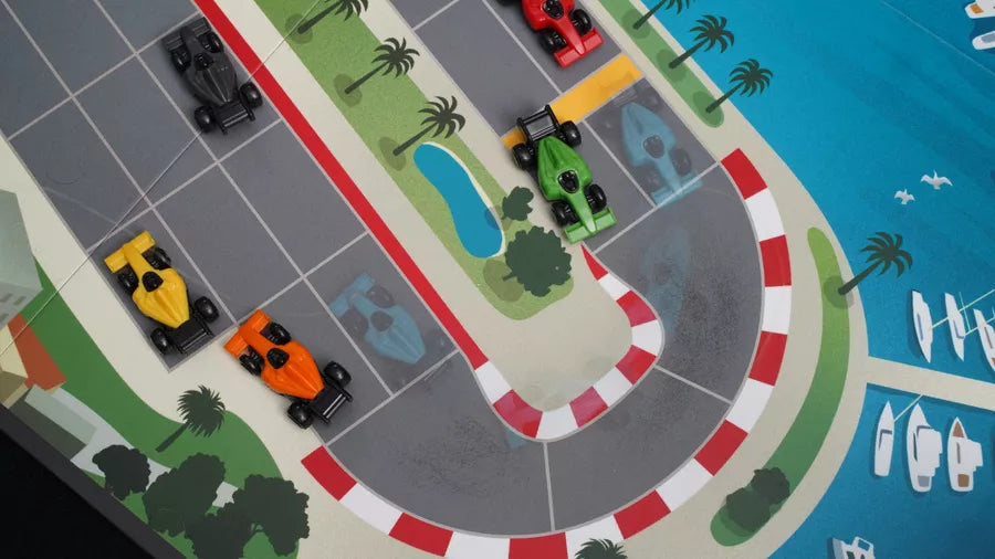 Downforce de Wolfgang Kramer: El juego de la velocidad de alto riesgo