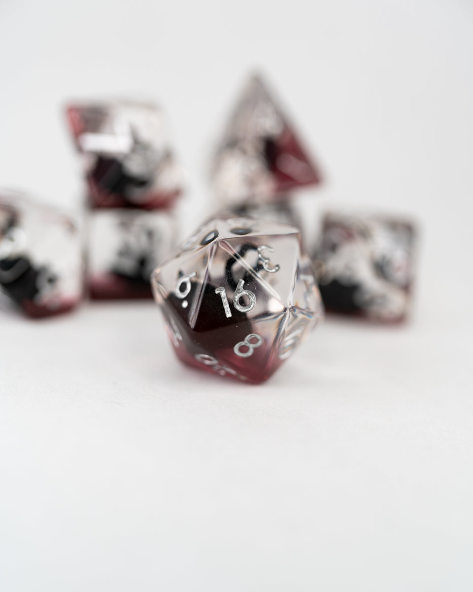Black Swan | Black Swan | 7 Piece Acrylic Inclusion Dice Set - Emberglow Gaming