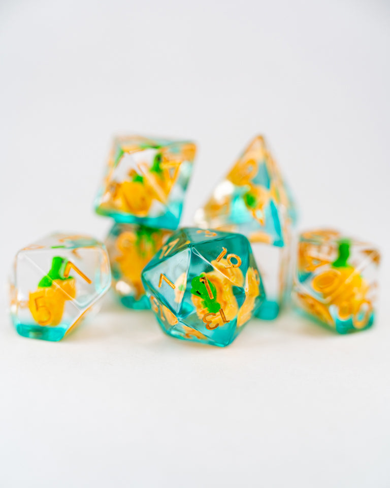 Chomper | Dino Egg | 7 Piece Acrylic Inclusion Dice Set - Emberglow Gaming